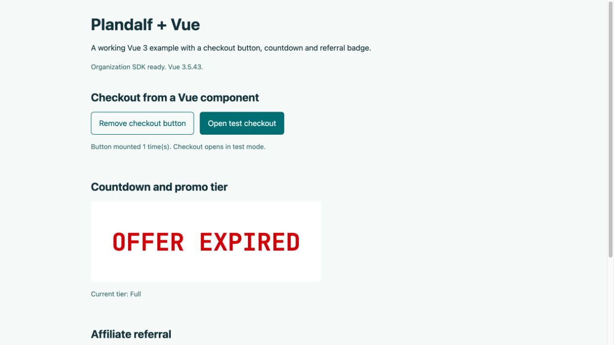 Real Vue example with the organization SDK ready and a checkout button mounted after loading.